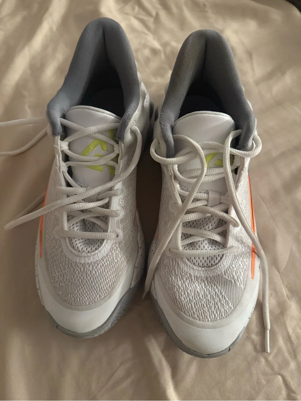 Nike Kids White Sneakers with Orange and Black Swoosh and Gray Collar